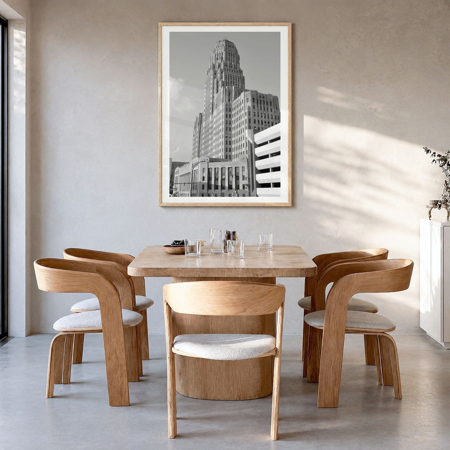 Buffalo Photo No 1 Poster in a natural wood frame, hanging in a dining room, white border