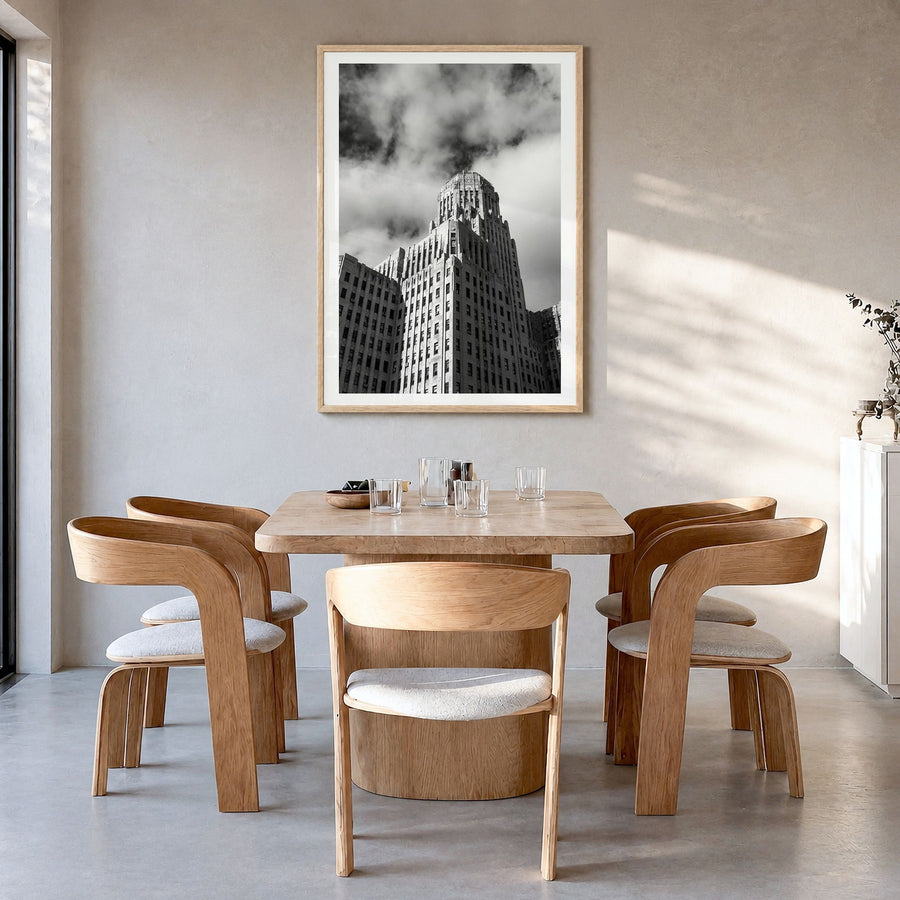 Buffalo Photo No 2 Poster in a natural wood frame, hanging in a dining room, white border