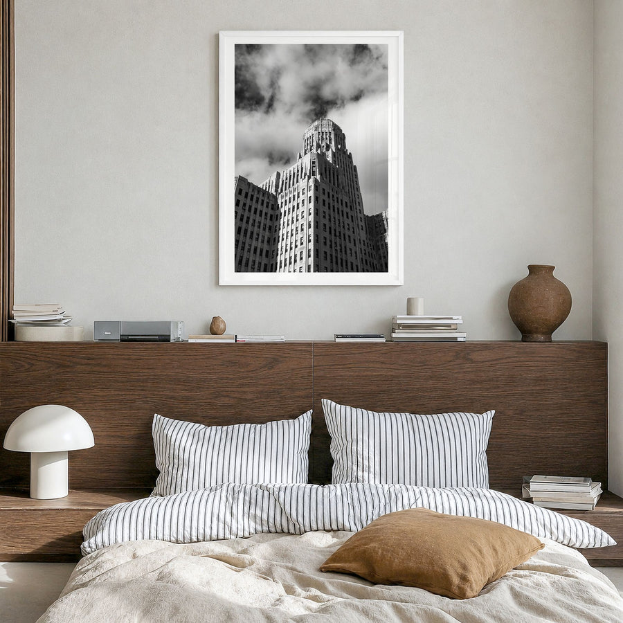 Buffalo Photo No 2 Poster in a white wood frame, hanging in a bedroom, white border