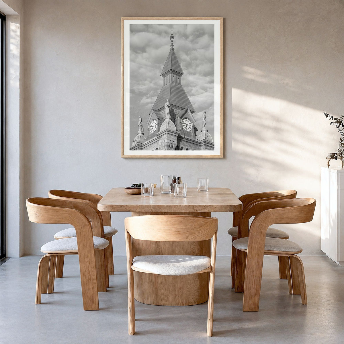 Buffalo Photo No 3 Poster in a natural wood frame, hanging in a dining room, white border