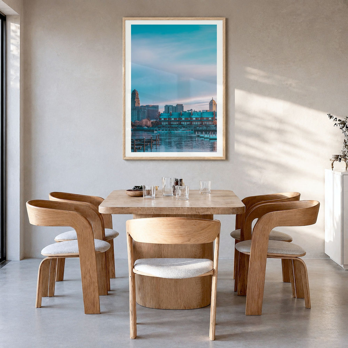 Buffalo Photo No 1 Poster in a natural wood frame, hanging in a dining room, white border