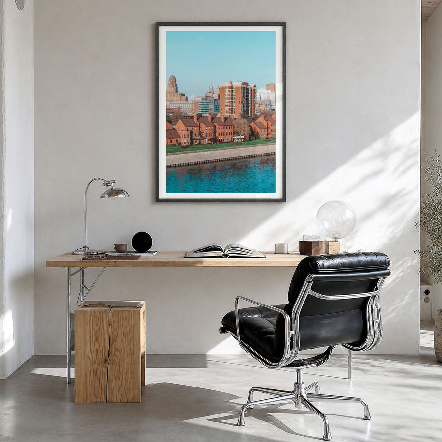 Buffalo Photo No 2 Poster in a black wood frame, hanging in a bright home office, white border