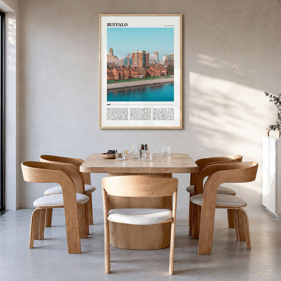 Buffalo Travel Poster in a natural wood frame, hanging in a dining room