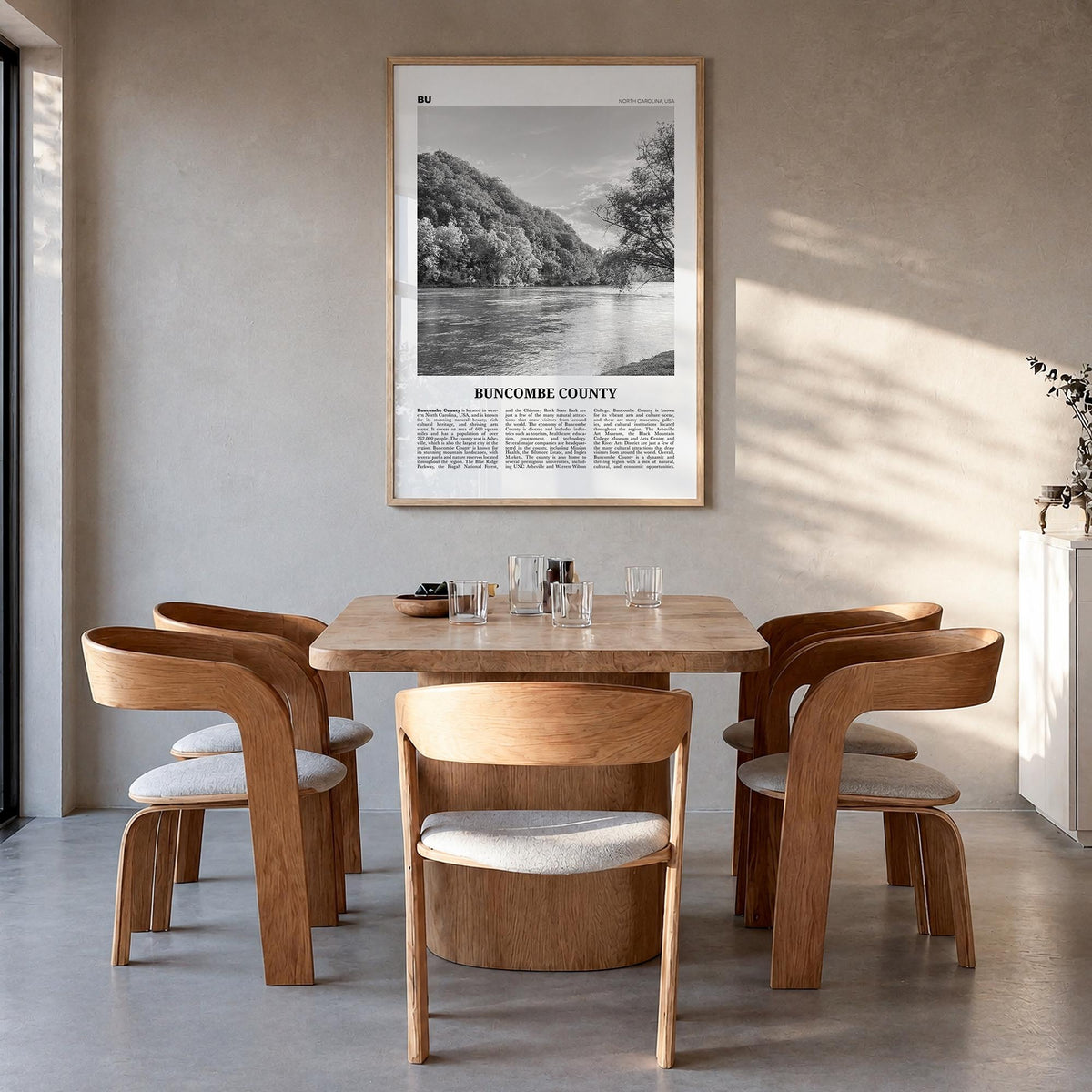 Buncombe County black & white newspaper poster of North Carolina, USA – vertical wall art in natural wood frame, hanging on w