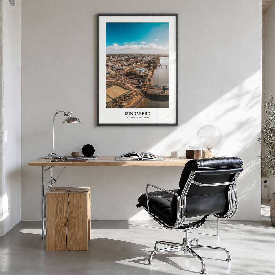 Bundaberg Classic No 1 Poster in a black wood frame, hanging in a bright home office