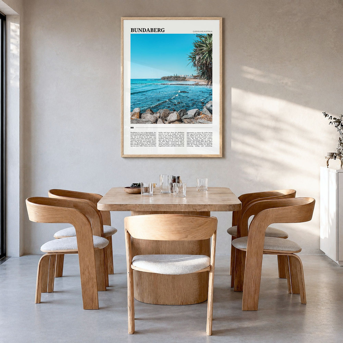 Bundaberg Travel No 2 Poster in a natural wood frame, hanging in a dining room