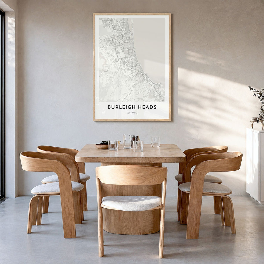 Burleigh Heads Map Poster in a natural wood frame, hanging in a dining room