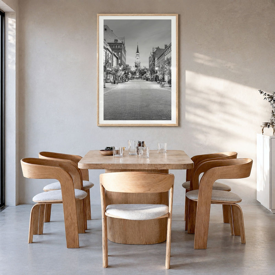 Burlington, Vermont Photo Poster in a natural wood frame, hanging in a dining room, white border