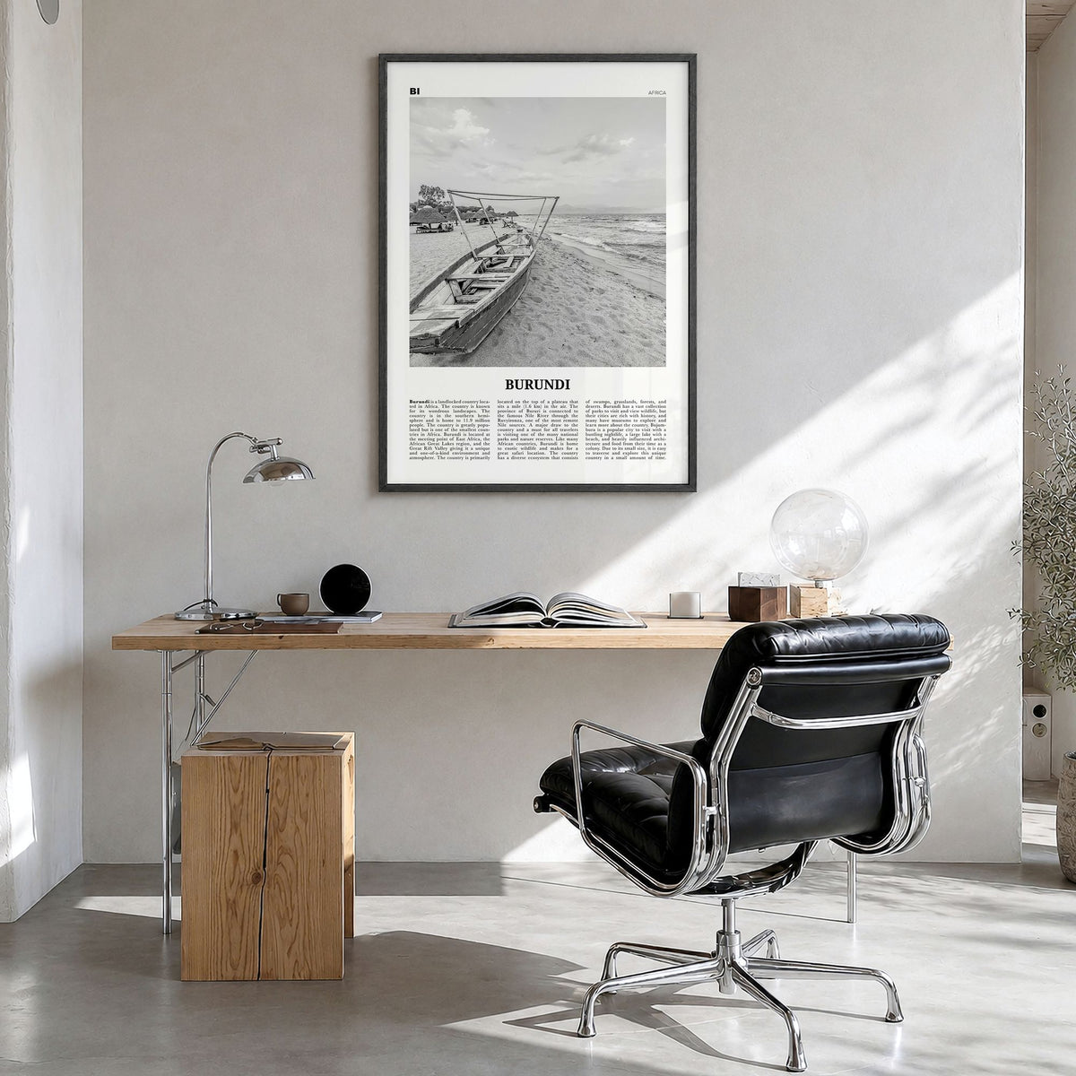 Burundi Newspaper Poster in a black wood frame, hanging in a bright home office