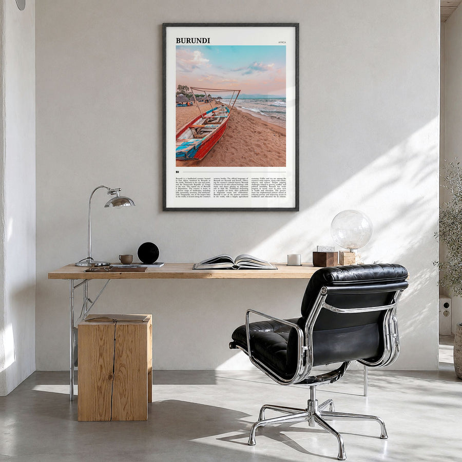 Burundi Travel Poster in a black wood frame, hanging in a bright home office