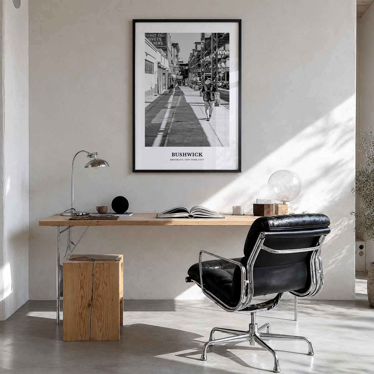 Bushwick black & white classic poster of Brooklyn, New York City – vertical wall art in black wood frame, hanging on wall