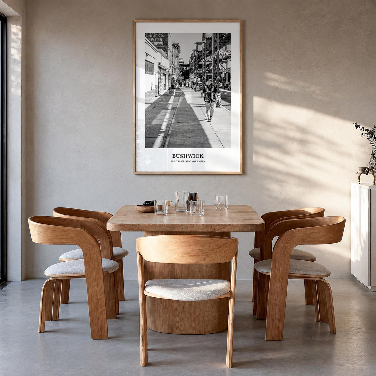 Bushwick black & white classic poster of Brooklyn, New York City – vertical wall art in natural wood frame, hanging on wall