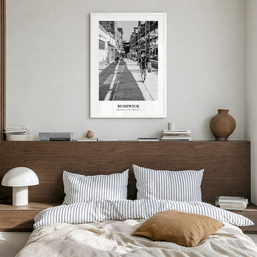 Bushwick Classic Poster in a white wood frame, hanging in a bedroom
