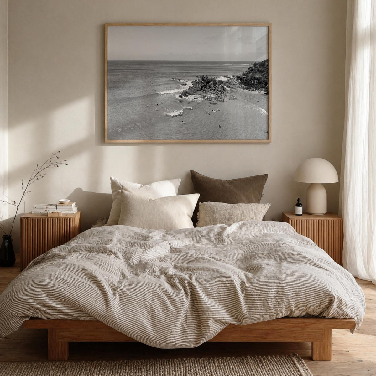 Byron Bay black & white photo poster of New South Wales, Australia – horizontal wall art in natural wood frame, hanging on wa