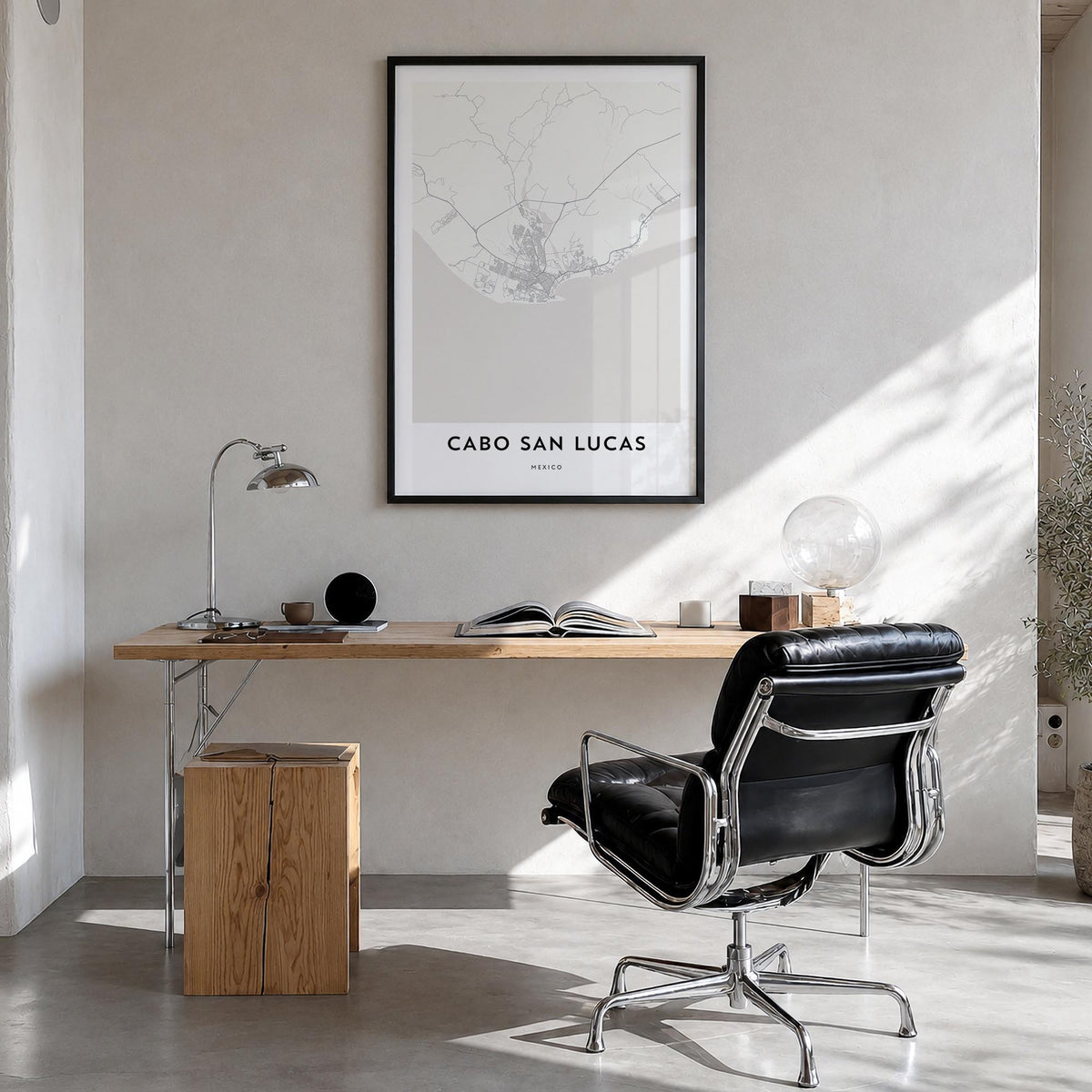 Cabo San Lucas black & white map poster of Mexico – vertical wall art in black wood frame, hanging on wall