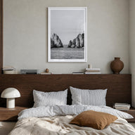 Cabo San Lucas black & white photo poster of Mexico – vertical wall art in white wood frame with white border, hanging on wal