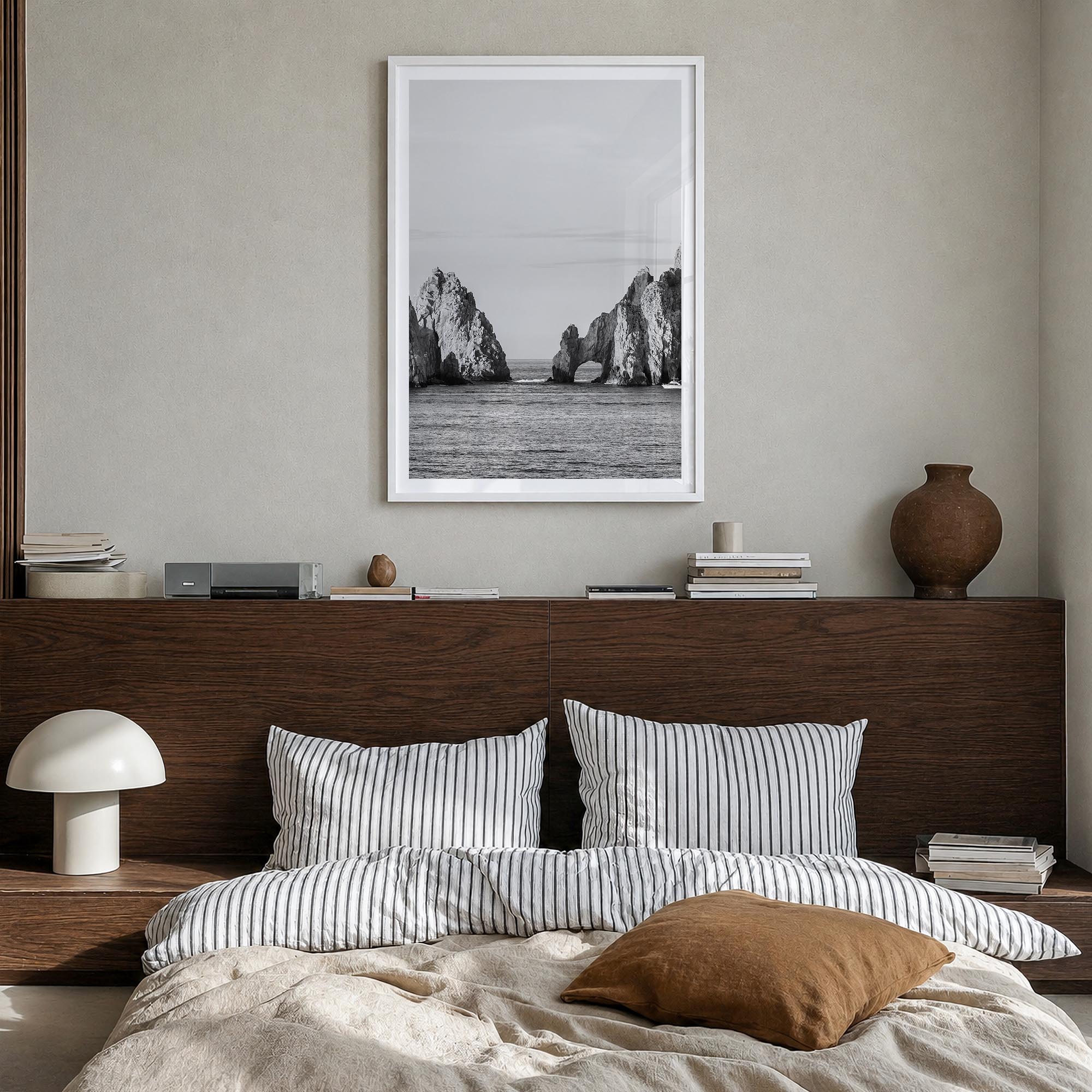 Cabo San Lucas black & white photo poster of Mexico – vertical wall art in white wood frame with white border, hanging on wal