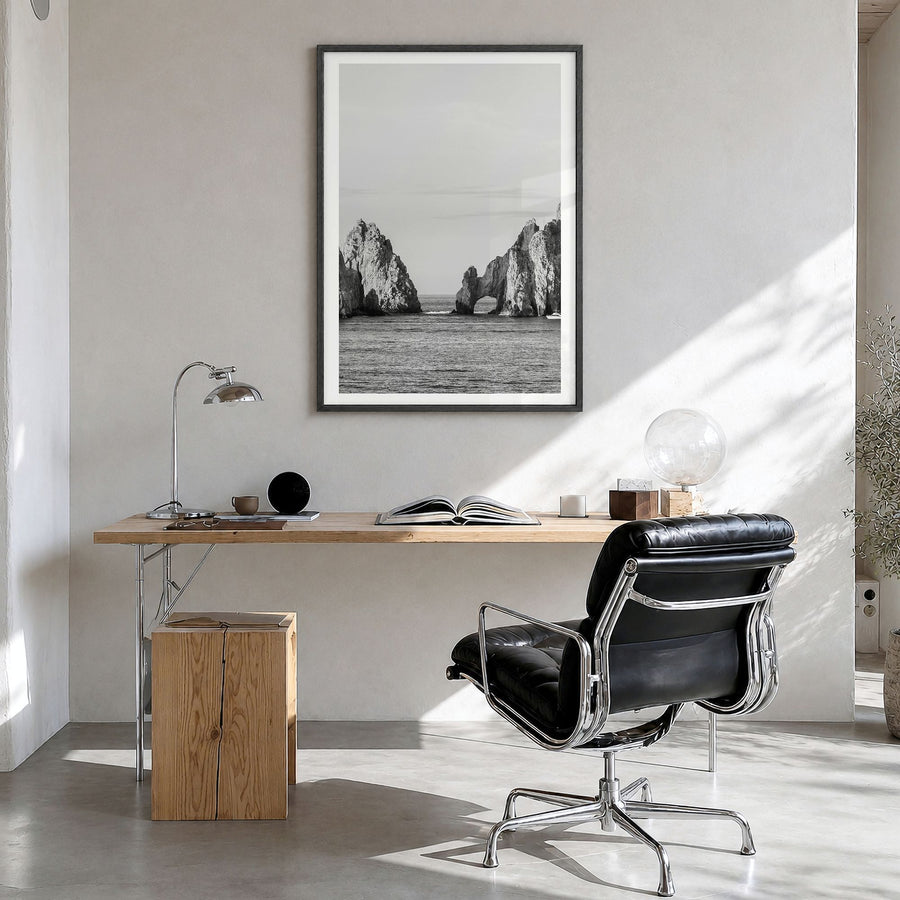 Cabo San Lucas Photo Poster in a black wood frame, hanging in a bright home office, white border