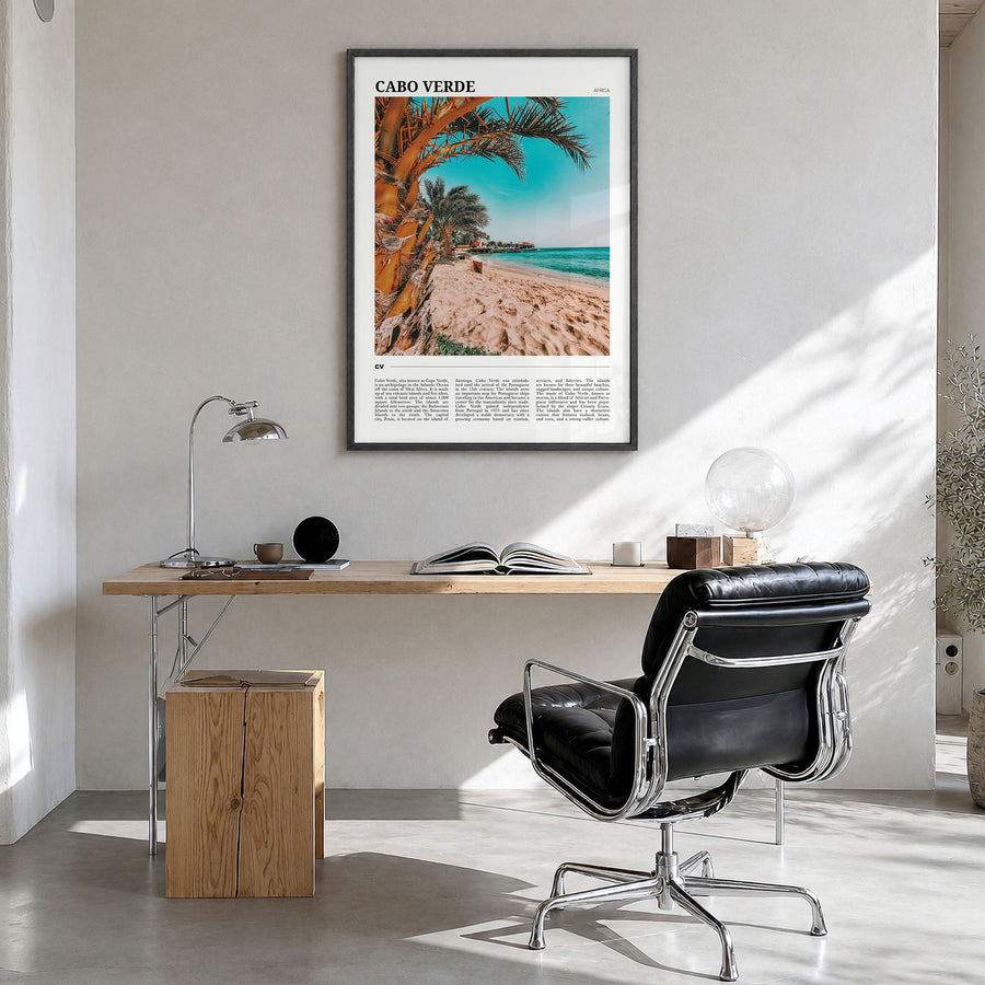 Cabo Verde Travel Poster in a black wood frame, hanging in a bright home office