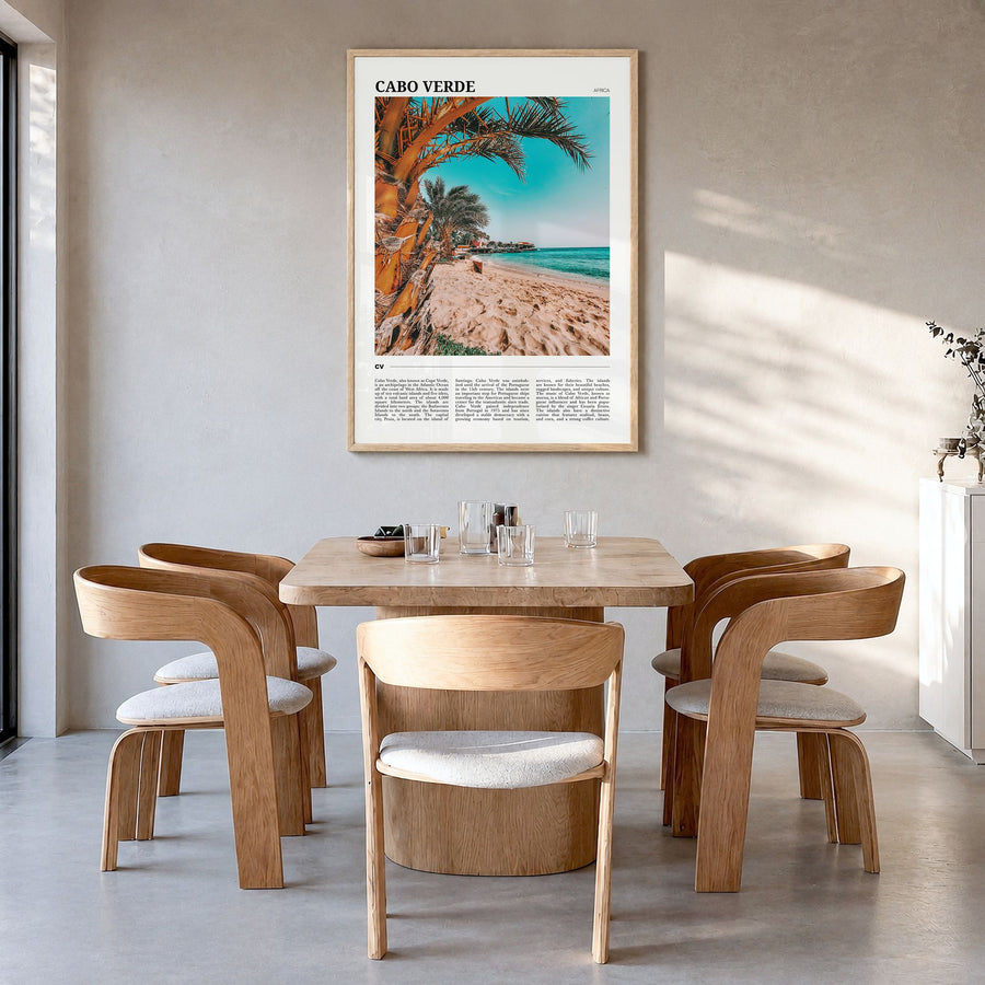 Cabo Verde Travel Poster in a natural wood frame, hanging in a dining room