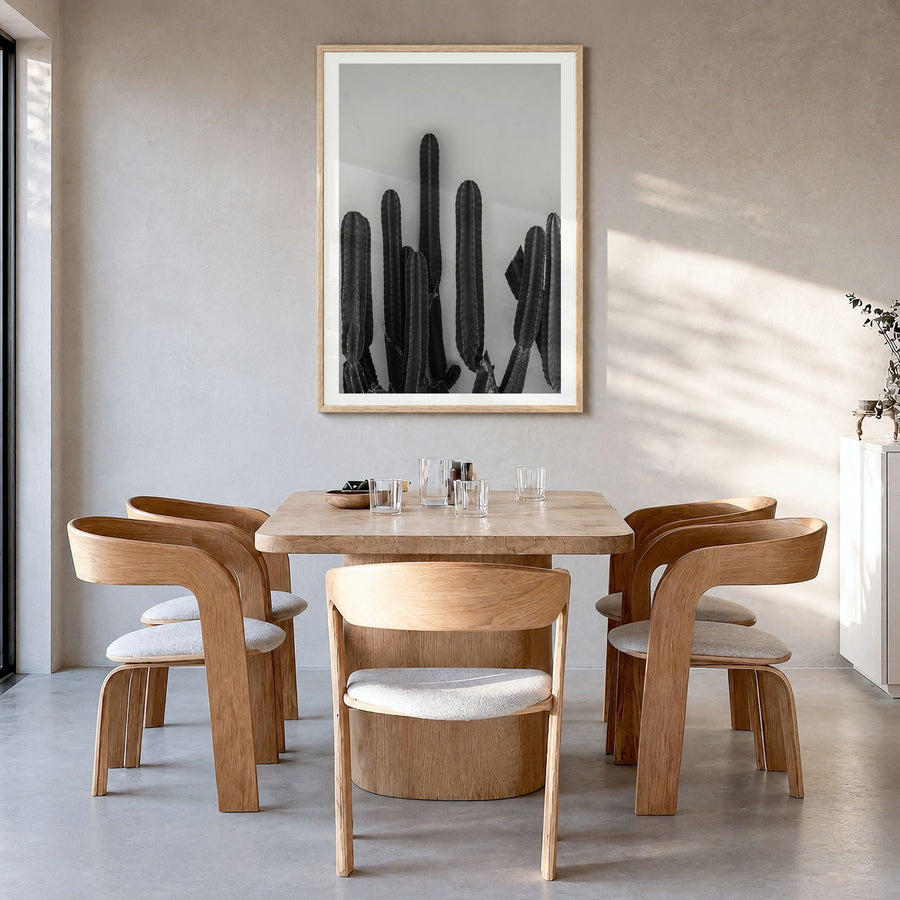 Cactus Photo No 2 Poster in a natural wood frame, hanging in a dining room, white border
