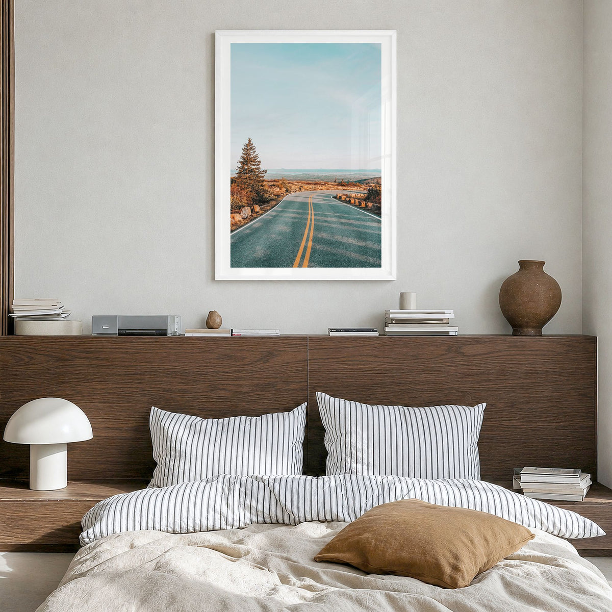 Cadillac Mountain Photo Poster in a white wood frame, hanging in a bedroom, white border