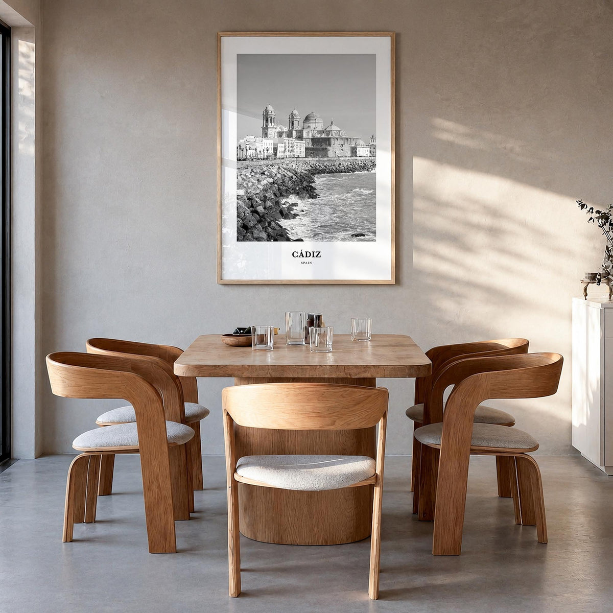 Cádiz black & white classic poster of Spain – vertical wall art in natural wood frame, hanging on wall