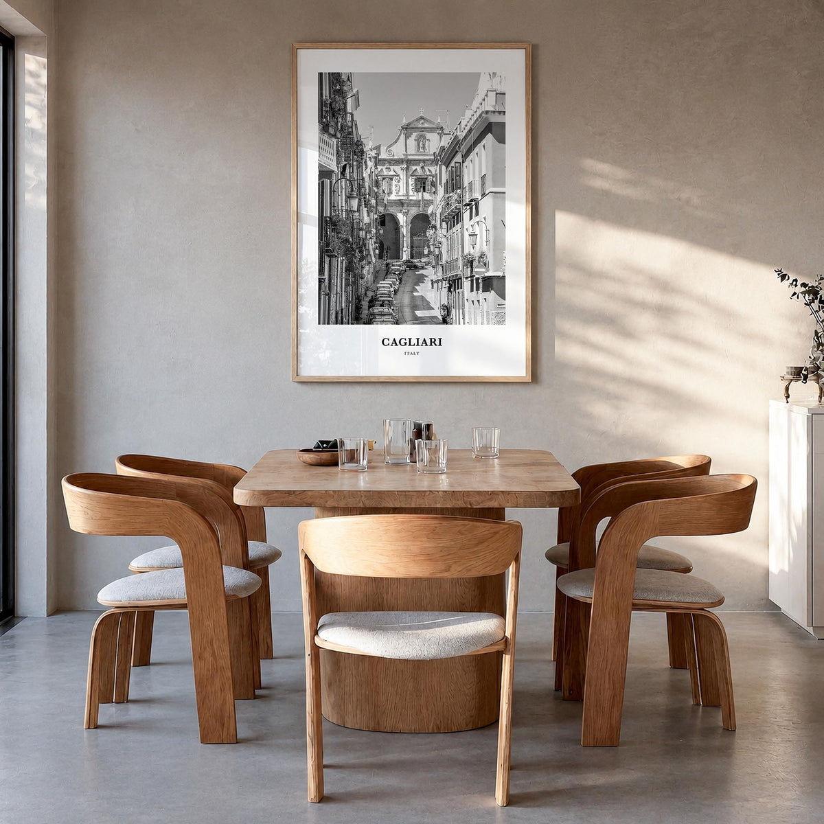 Cagliari no. 2 black & white classic poster of Italy – vertical wall art in natural wood frame, hanging on wall