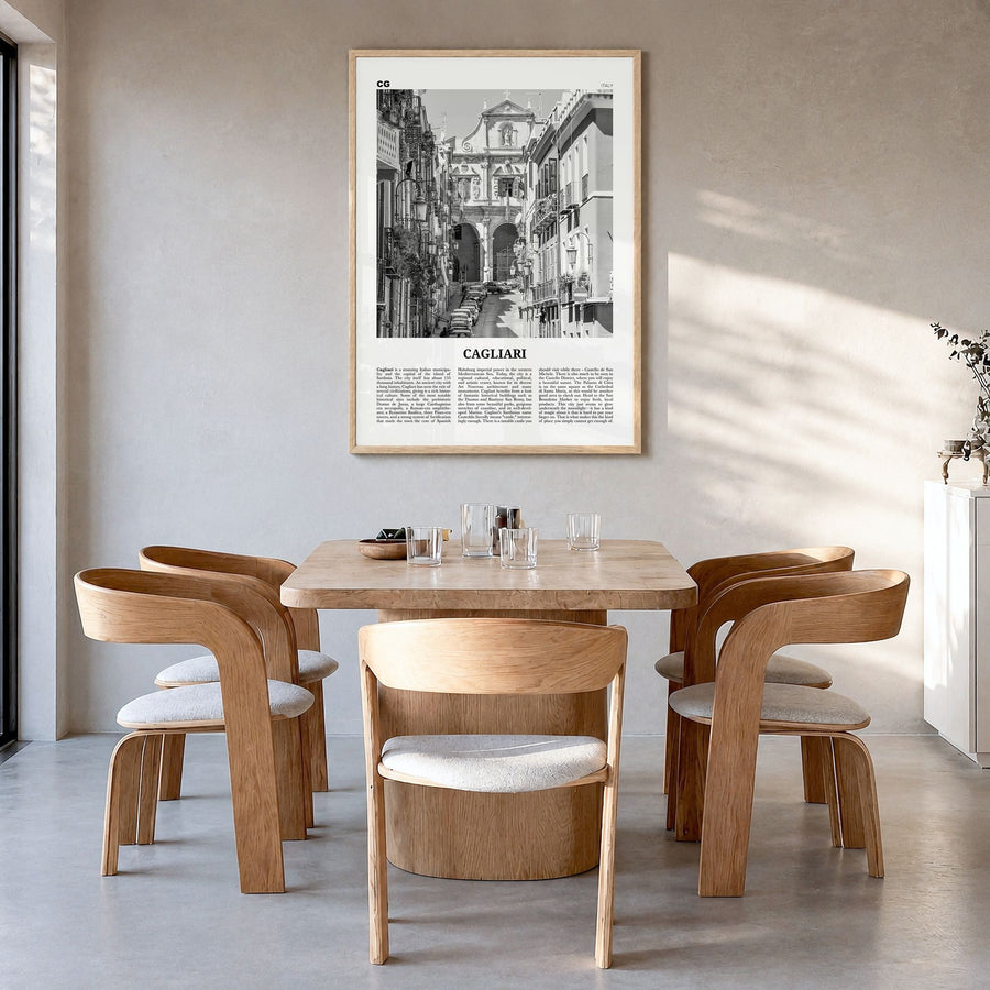 Cagliari Newspaper No 2 Poster in a natural wood frame, hanging in a dining room