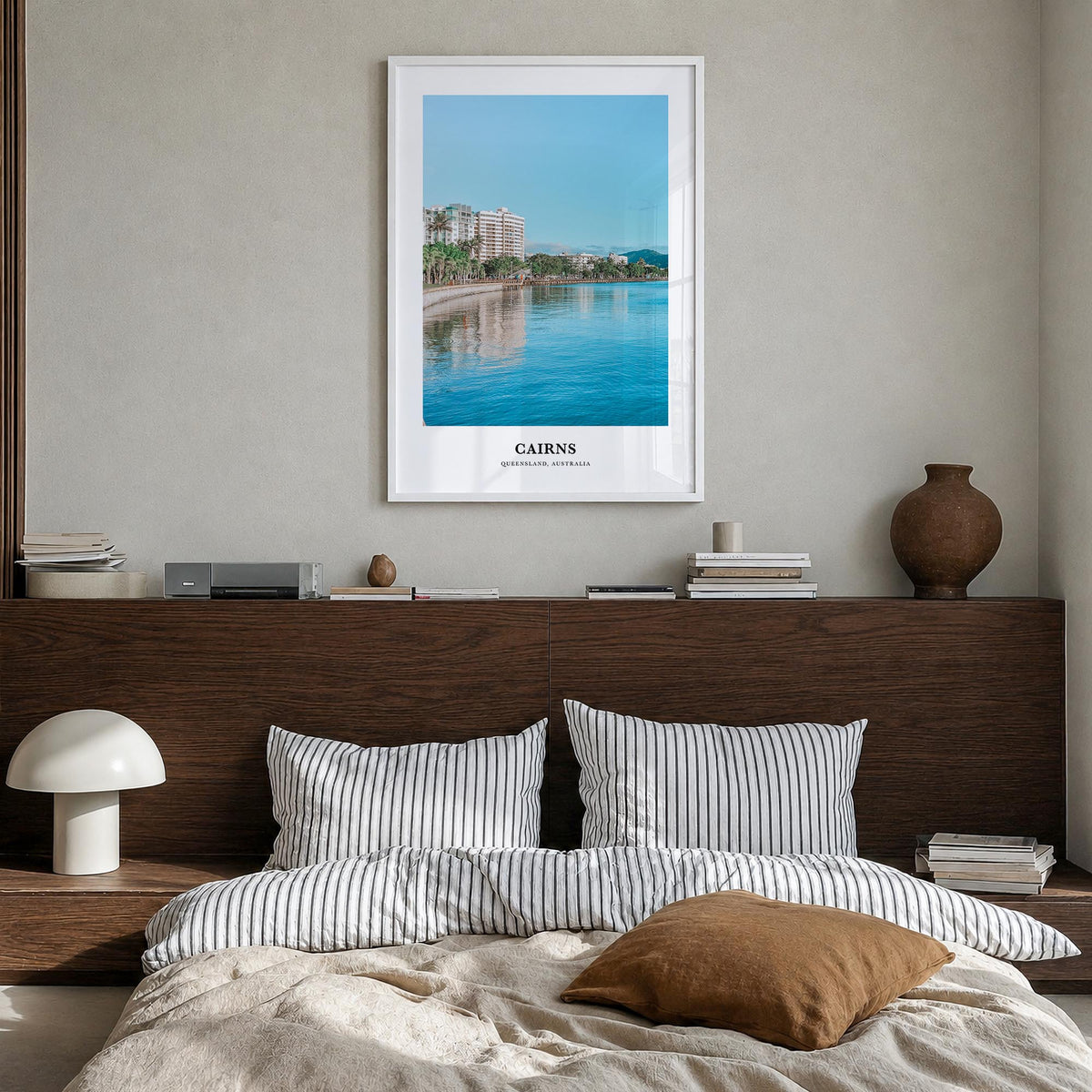 Cairns colorful classic poster of Queensland, Australia – vertical wall art in white wood frame, hanging on wall