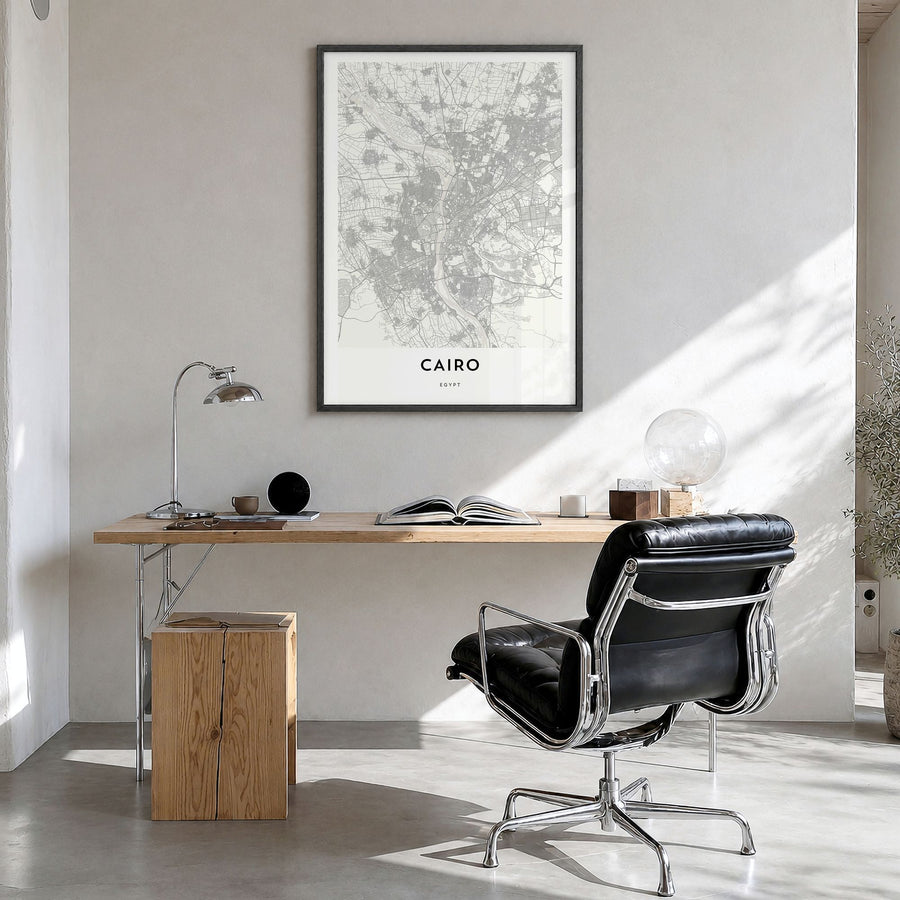 Cairo Map Poster in a black wood frame, hanging in a bright home office