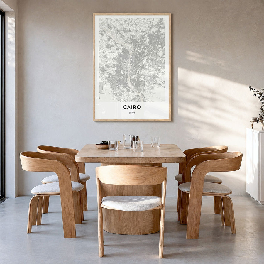 Cairo Map Poster in a natural wood frame, hanging in a dining room