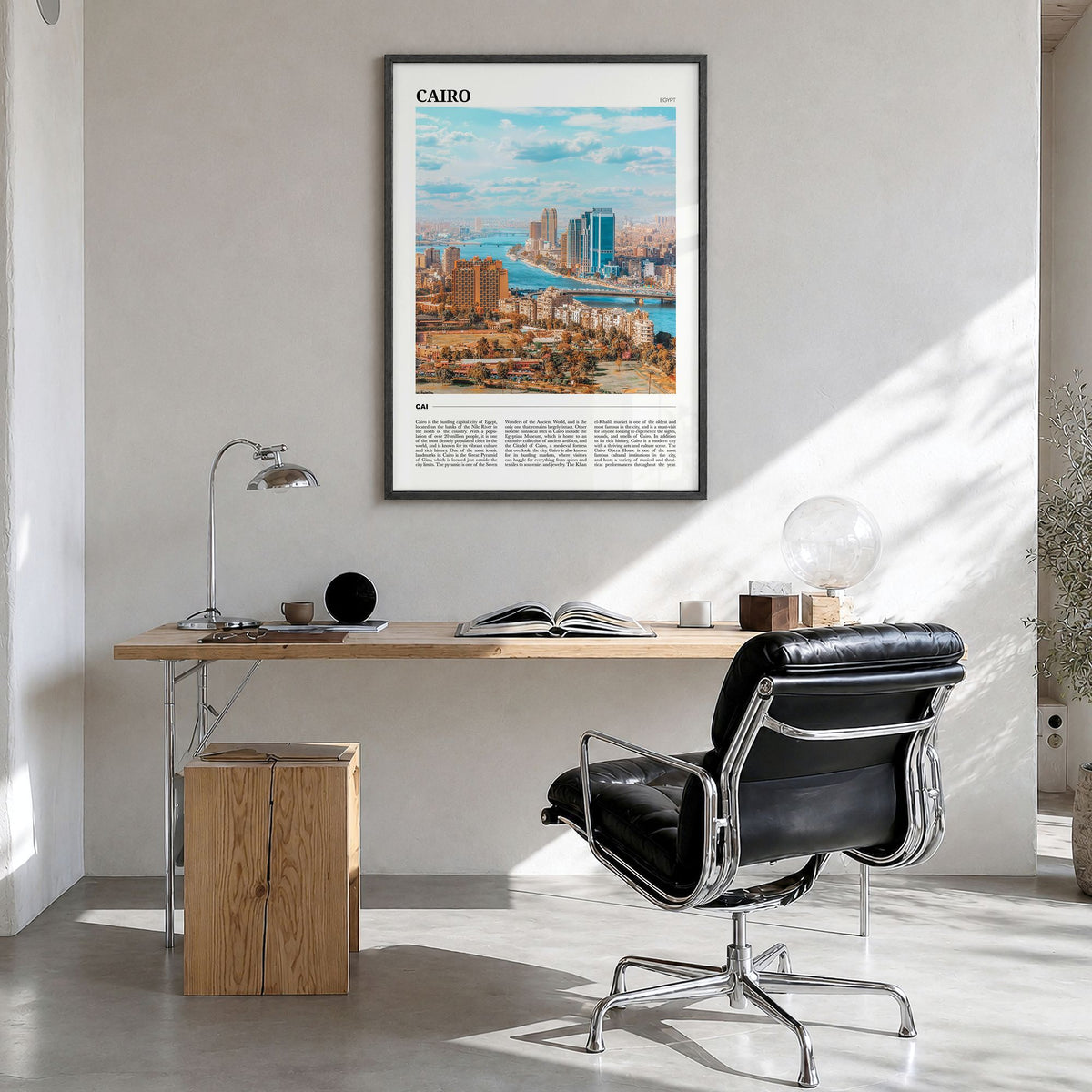 Cairo Travel Poster in a black wood frame, hanging in a bright home office