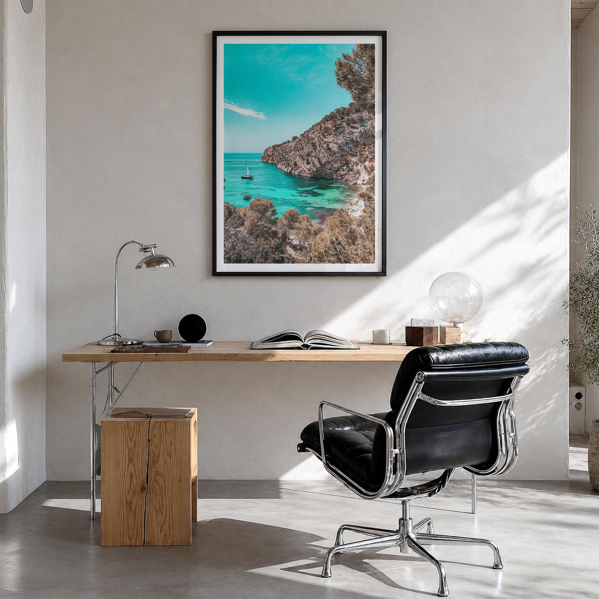 Cala Blanca colorful photo poster of Spain – vertical wall art in black wood frame with white border, hanging on wall