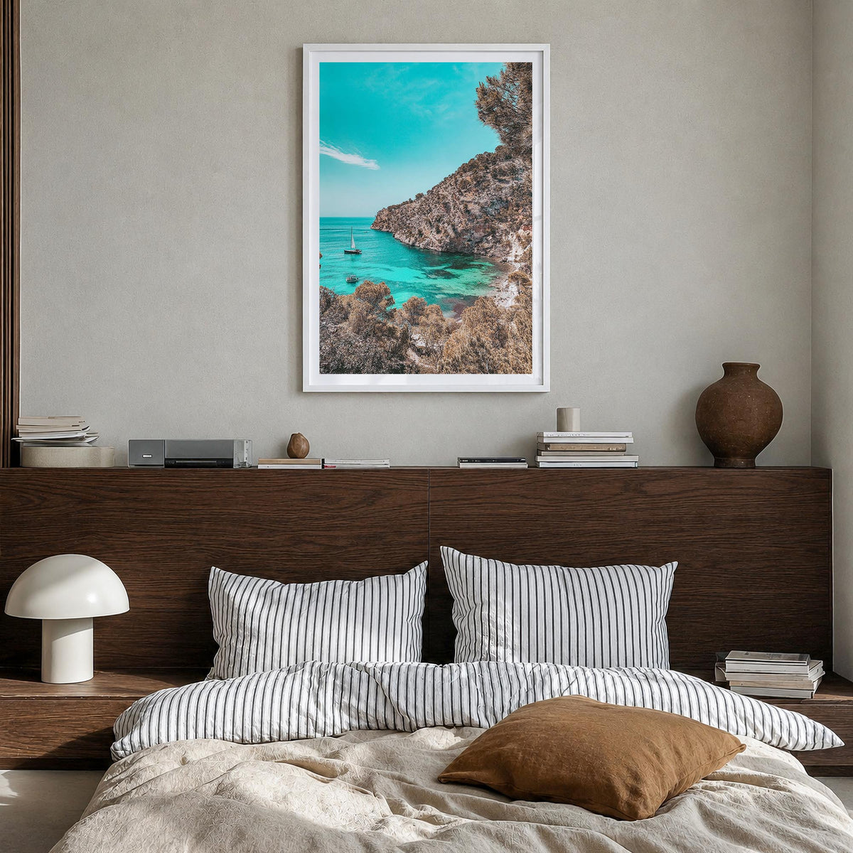 Cala Blanca colorful photo poster of Spain – vertical wall art in white wood frame with white border, hanging on wall