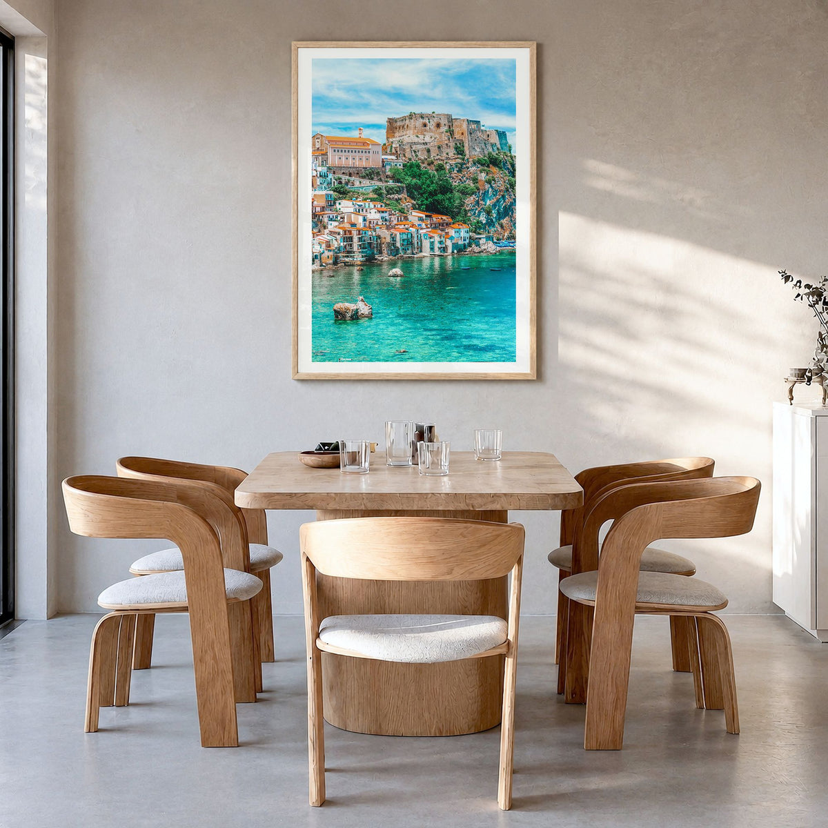 Calabria Photo No 1 Poster in a natural wood frame, hanging in a dining room, white border