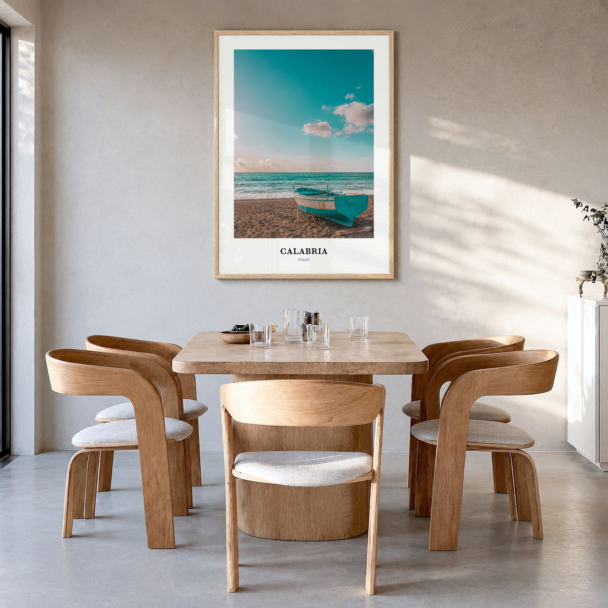 Calabria Classic No 1 Poster in a natural wood frame, hanging in a dining room