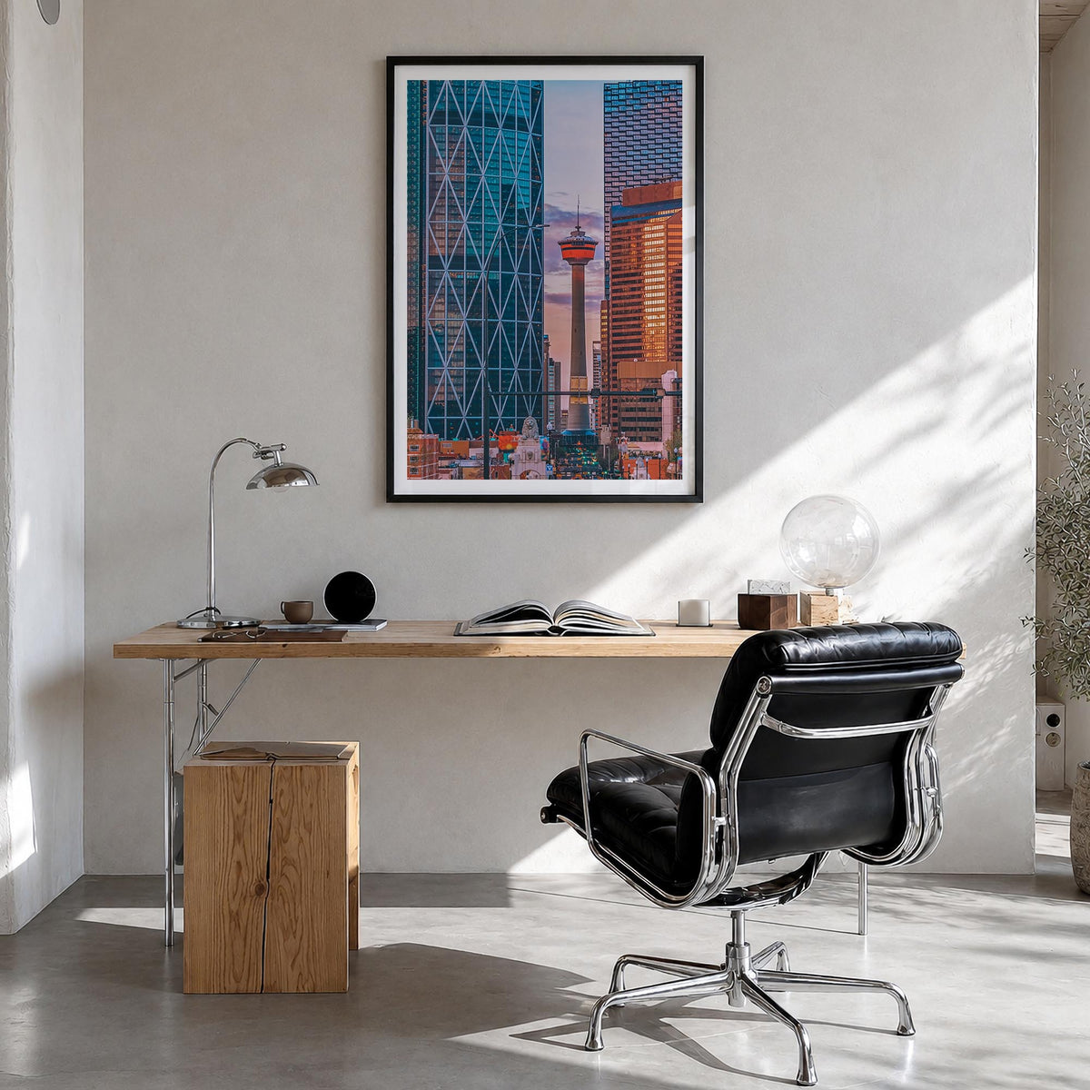 Calgary colorful photo poster of Alberta, Canada – vertical wall art in black wood frame with white border, hanging on wall