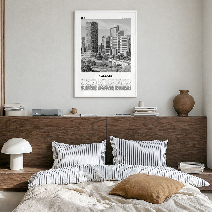 Calgary Newspaper No 2 Poster in a white wood frame, hanging in a bedroom
