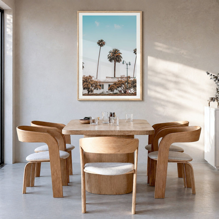 California Photo No 4 Poster in a natural wood frame, hanging in a dining room, white border