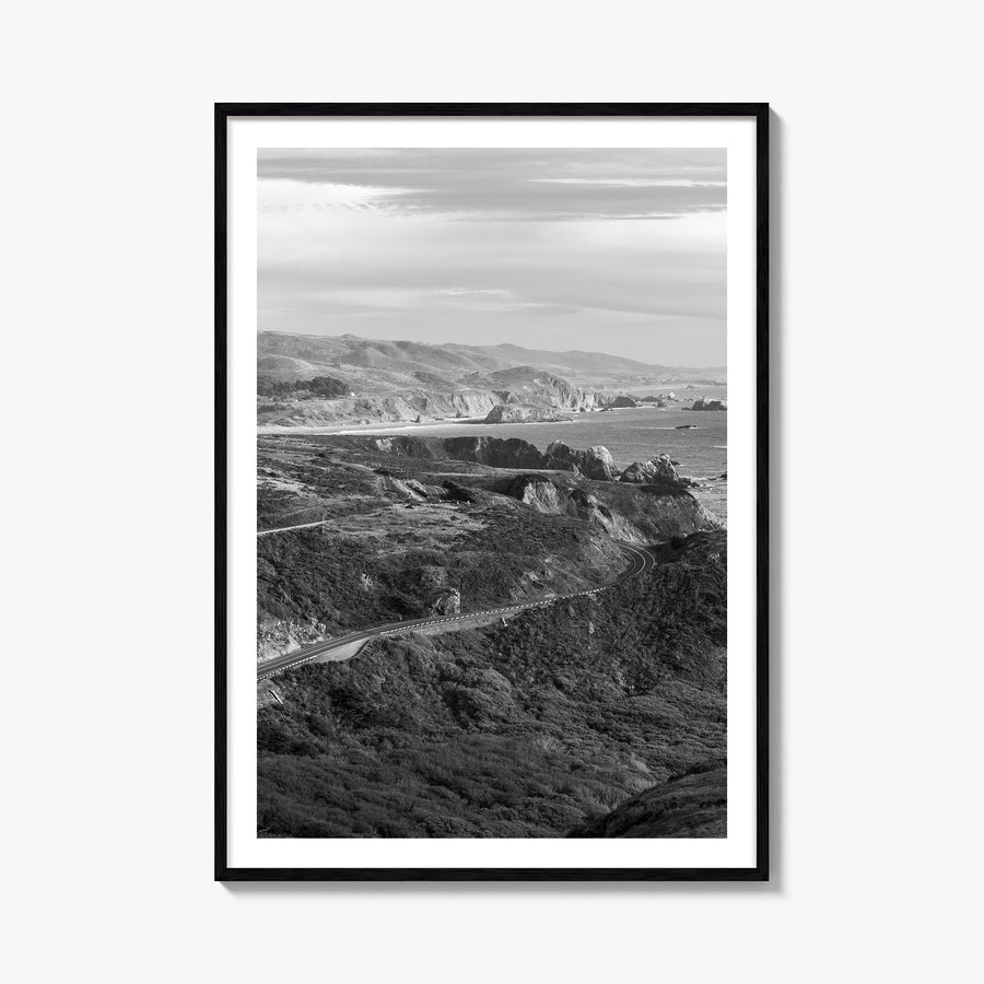 California State Route 1 black & white photo poster of California, USA – vertical wall art, unframed print shown in interior 