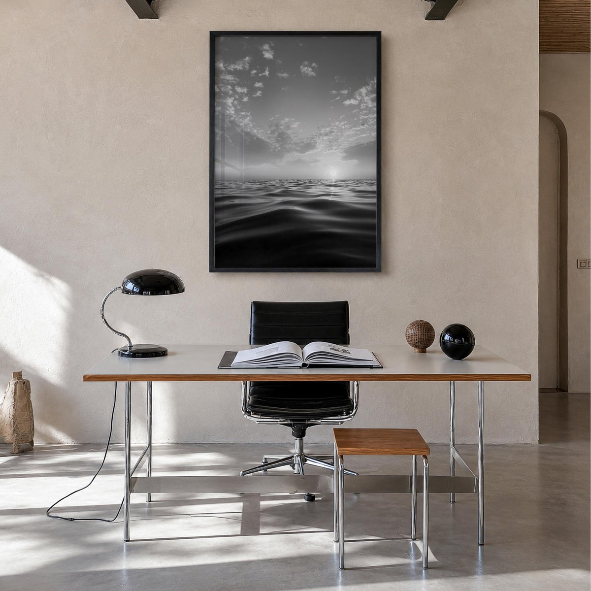 Calm Sunset black & white photo poster – vertical wall art in black wood frame, hanging on wall