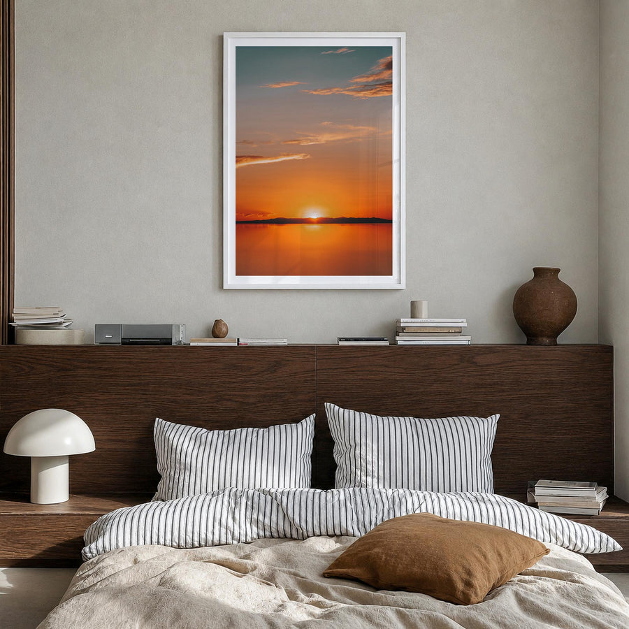 Calm Sunset no. 2 colorful photo poster – vertical wall art in white wood frame with white border, hanging on wall