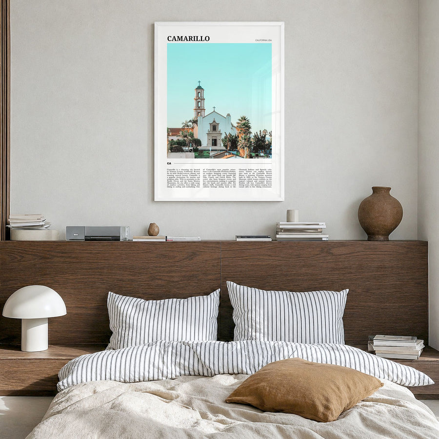 Camarillo Travel Poster in a white wood frame, hanging in a bedroom