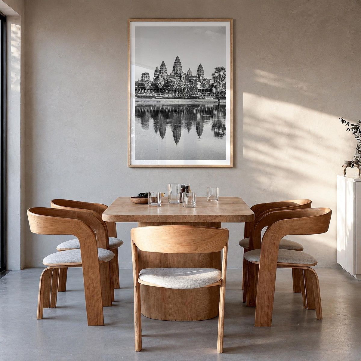 Cambodia black & white photo poster of Asia – vertical wall art in natural wood frame with white border, hanging on wall