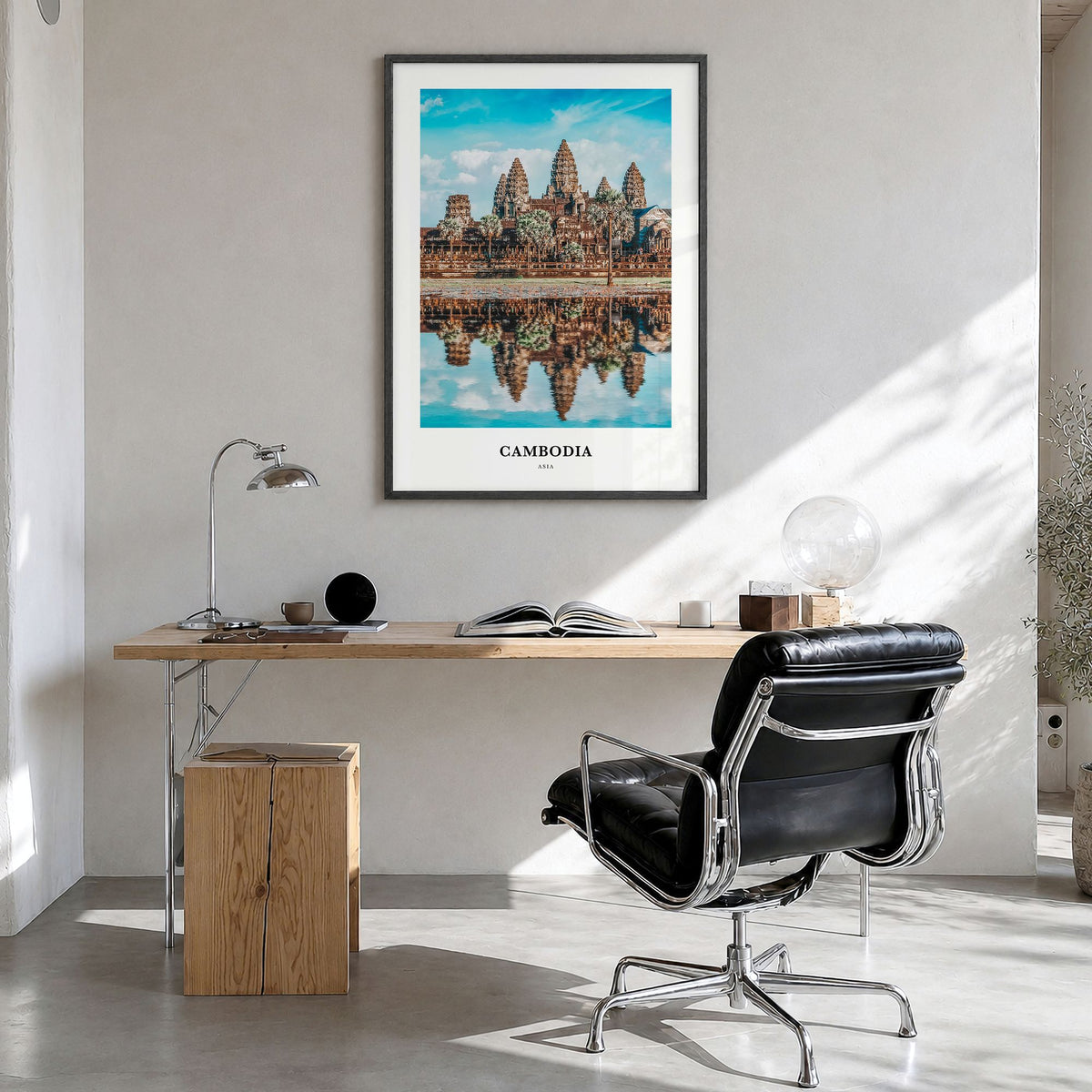 Cambodia Classic Poster in a black wood frame, hanging in a bright home office