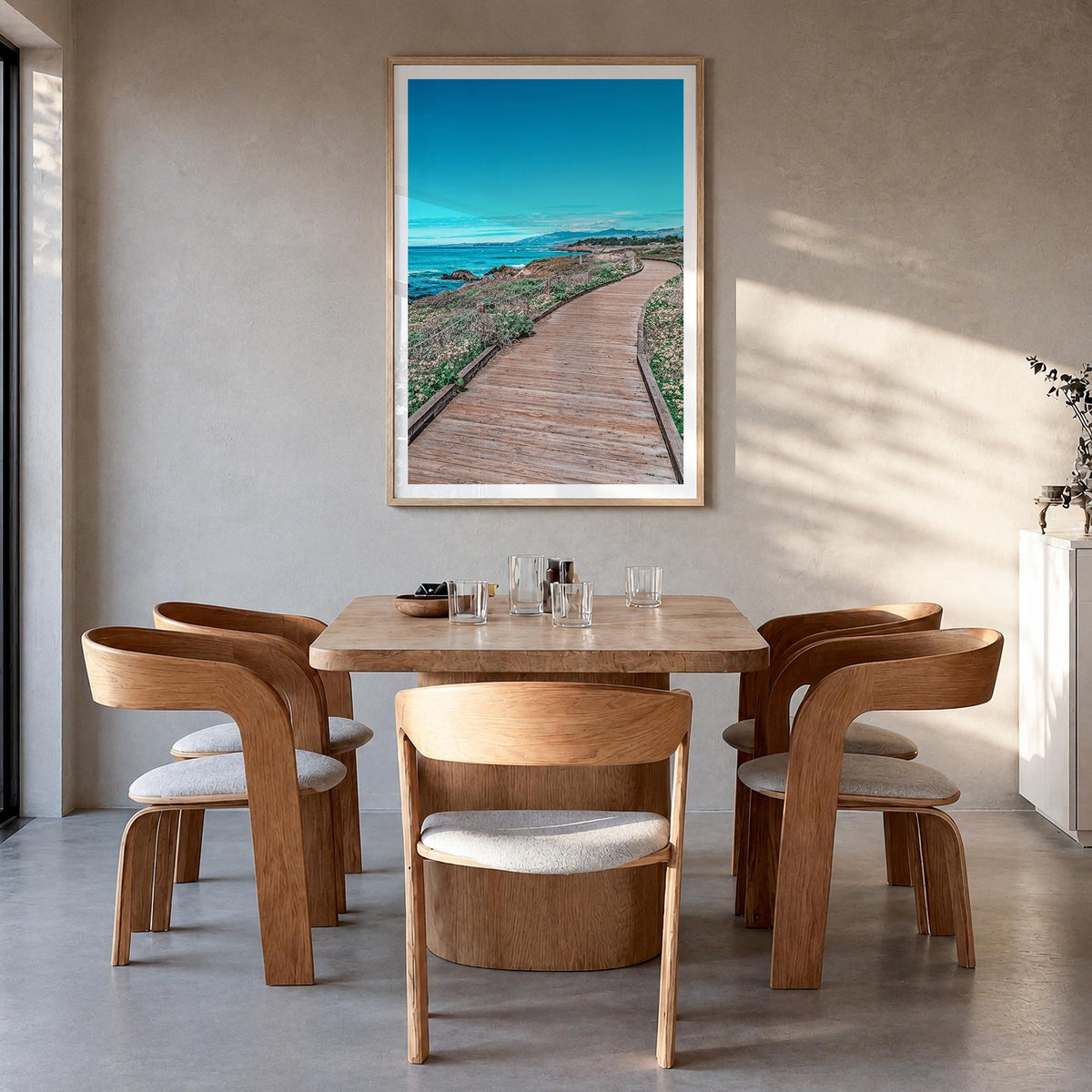 Cambria colorful photo poster of California, USA – vertical wall art in natural wood frame with white border, hanging on wall