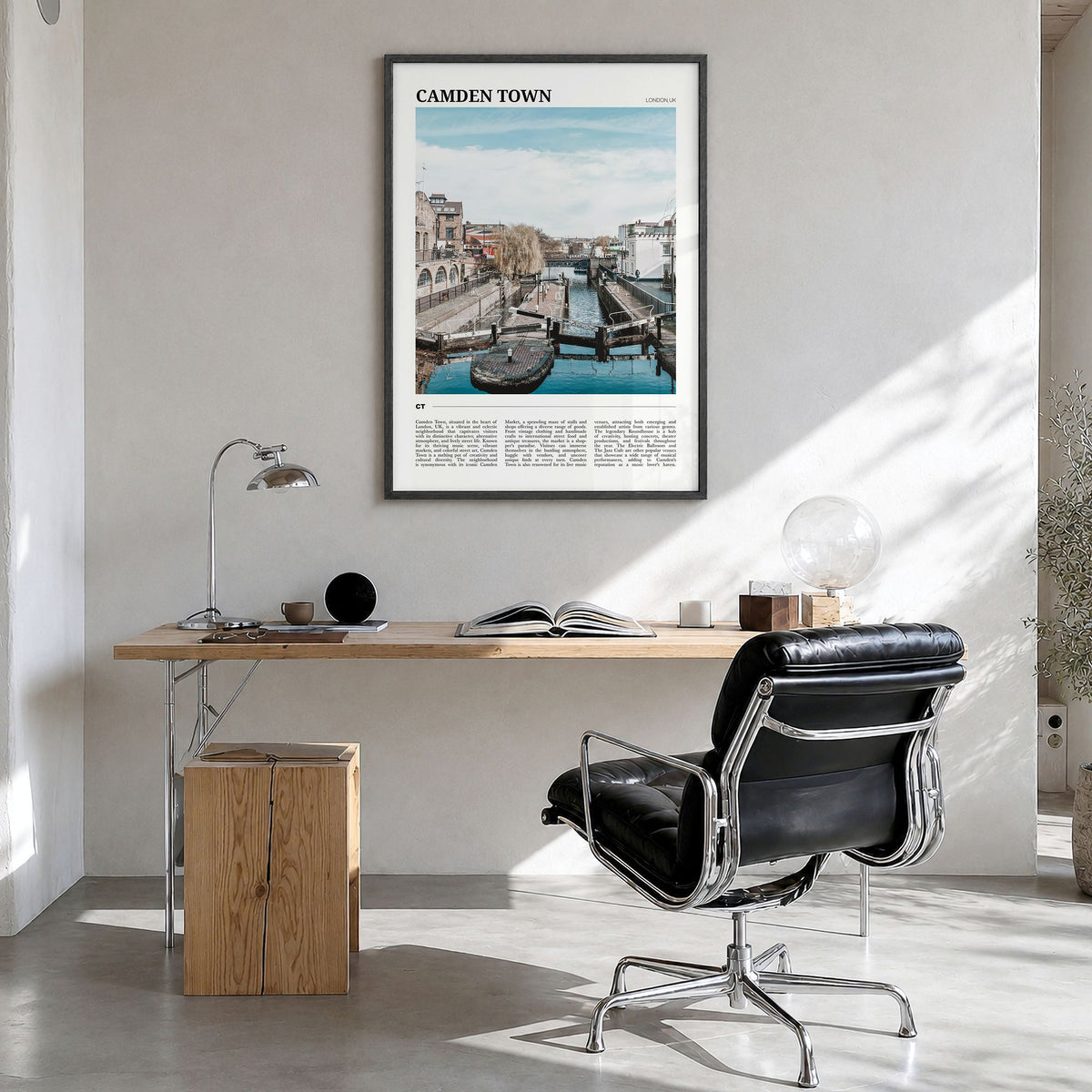 Camden Town Travel Poster in a black wood frame, hanging in a bright home office