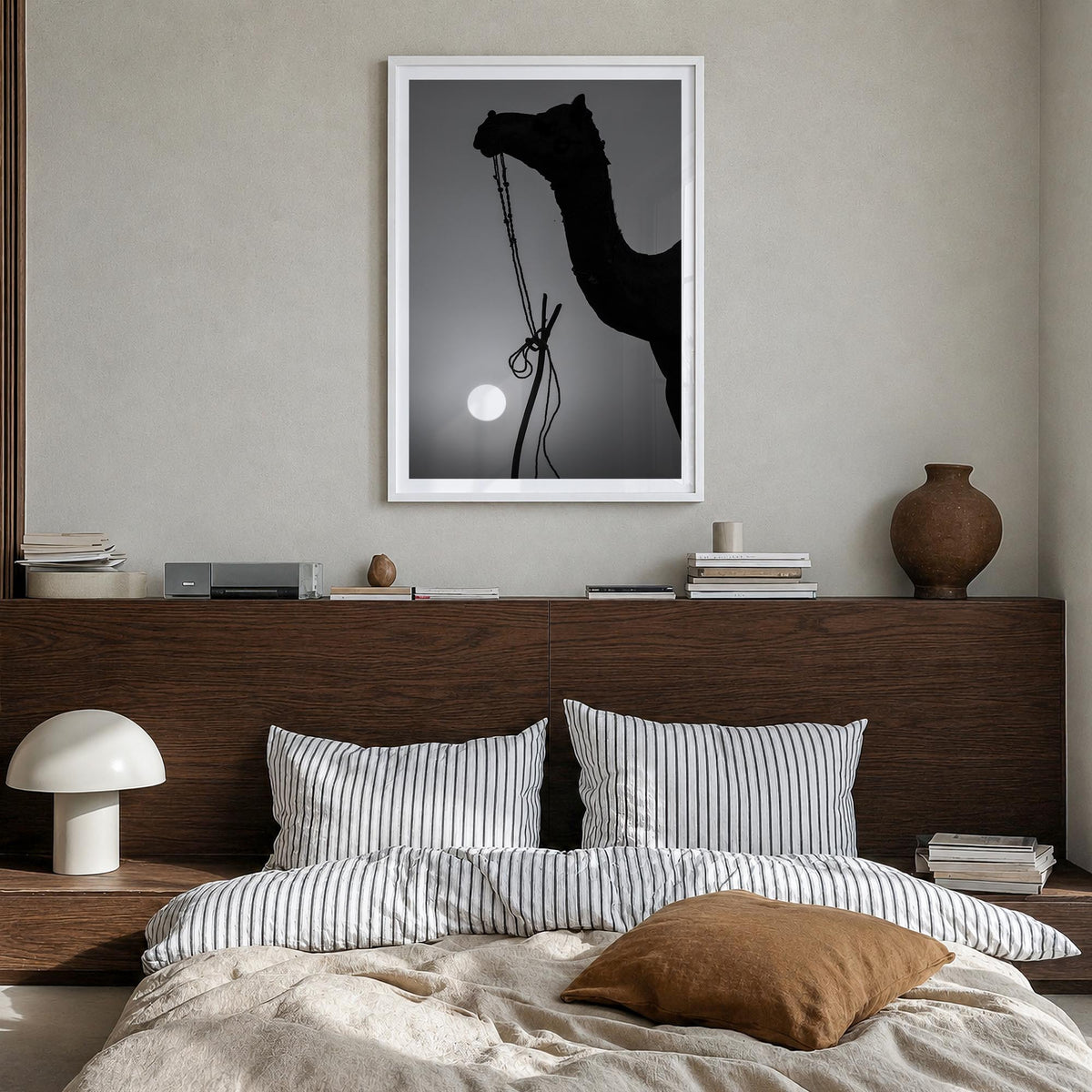 Camel Caravan no. 1 black & white photo poster – vertical wall art in white wood frame with white border, hanging on wall