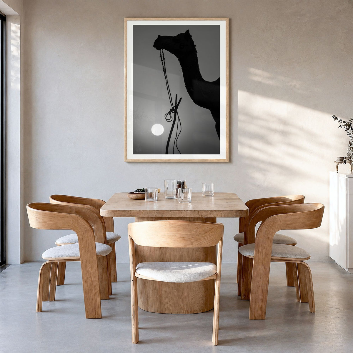 Camel Caravan Photo No 1 Poster in a natural wood frame, hanging in a dining room, white border
